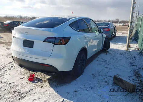 2025 Tesla Model Y Long Range Dual Motor All-Wheel Drive z USA, uszkodzony, nr VIN 7SAYGDEE4SF246762